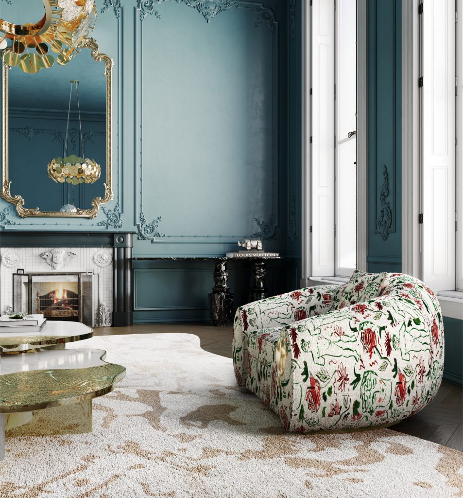 Vintage inspired- Living Room with a white armchair and flowers, with also a white and golden center table with items , blue wall, gold mirror